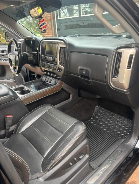 Detailed GMC Denali passenger seat, dashboard and centre console