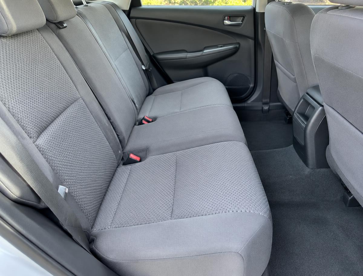 Cloth rear seats and carpet after stain removal in a sedan